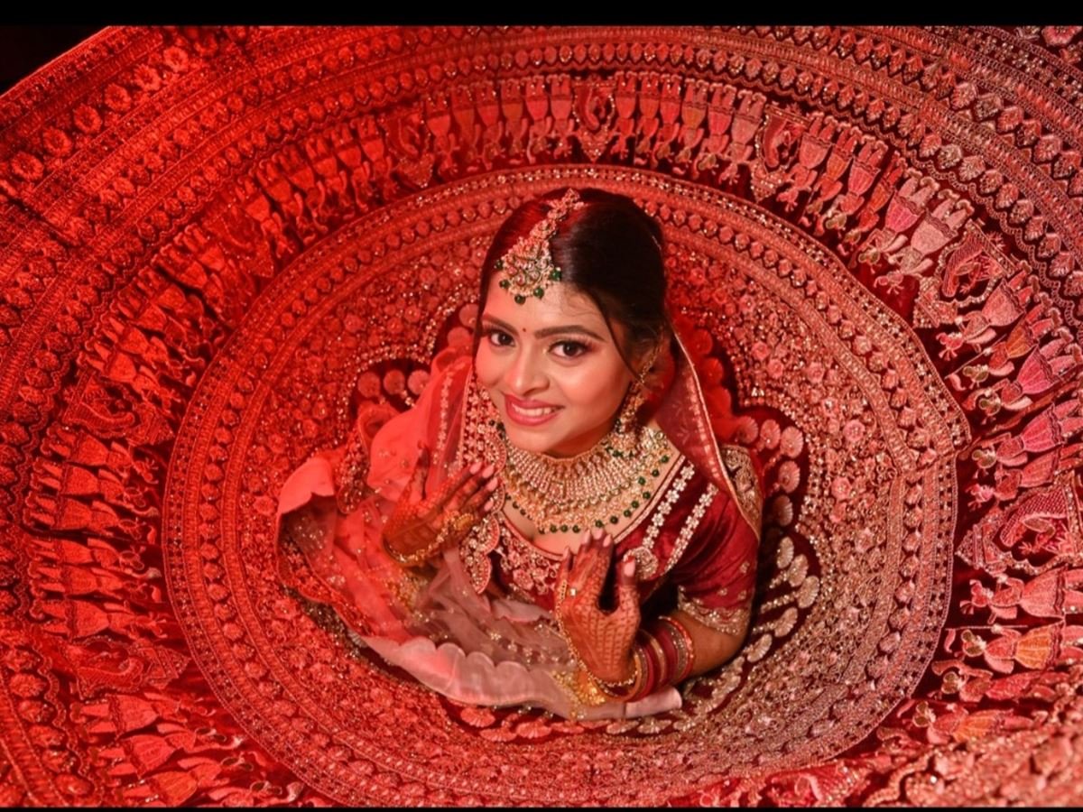 Artistic bridal portrait framed in red mandala. Best Bridal Salon Bhubaneswar | Sha lov Jagamara